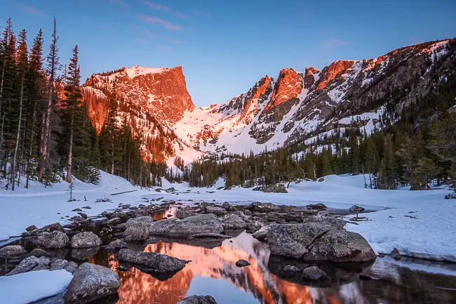 Dream Lake Sunrise reflection with snow and blue sky, Rocky Mountain National Park Photo Tours